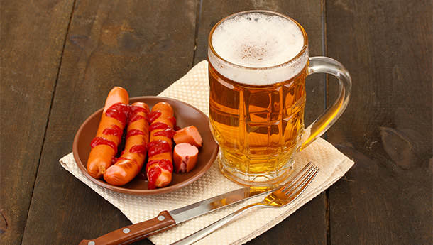 bigstock-Beer-and-grilled-sausages-on-w-54353297