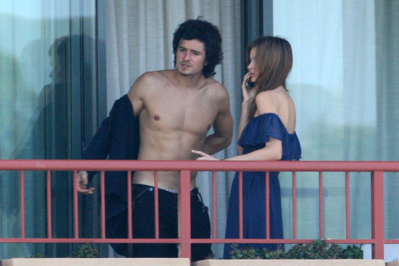 02-26-09 Sydney, Australia Orlando Bloom and Miranda Kerr are ENGAGED or so it seems as the inseperable lovers were seen on their hotel balcony showing off some serious PDA. Orlando and Miranda could not keep their hands off of each other. Orlando seemed to heat things up a little by removing his shirt and taking a peek at her boobs. Orlando is leaving sydney to fly home to LA, it sure does show how much he will miss her. EXCLUSIVE PIX by Flynet (C)2009 818-307-4813 Nicolas