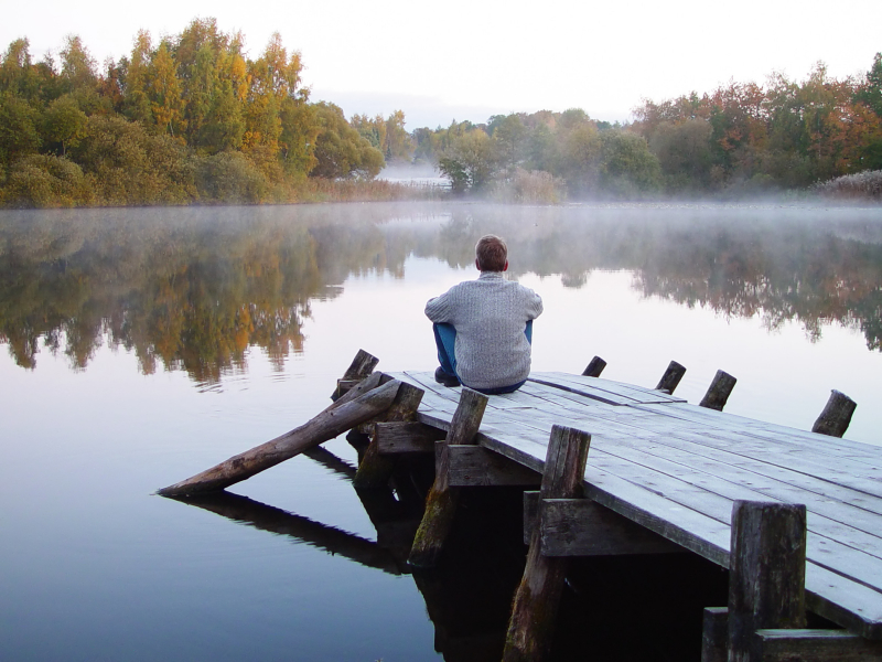 FEATURED-sound-of-silence-man-sitting-on-dock