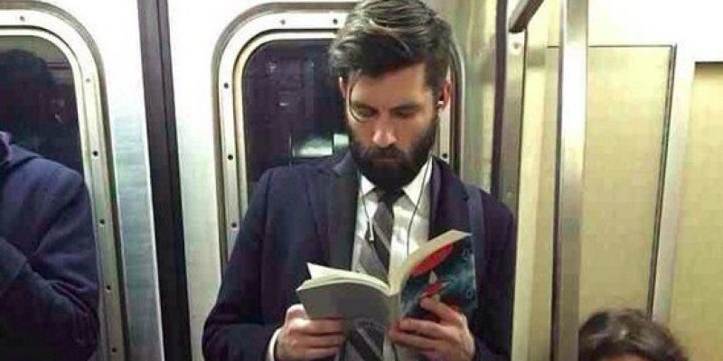Man-Reading-On-Tube-1
