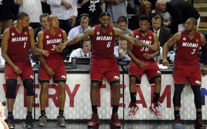 Jun 11, 2013; San Antonio, TX, USA; Miami Heat center Chris Bosh (1), Ray Allen (34), LeBron James (6), Norris Cole (30) and Dwyane Wade (3) react during a time-out against the San Antonio Spurs in the fourth quarter during game three of the 2013 NBA Finals at the AT&T Center. Mandatory Credit: Derick E. Hingle-USA TODAY Sports