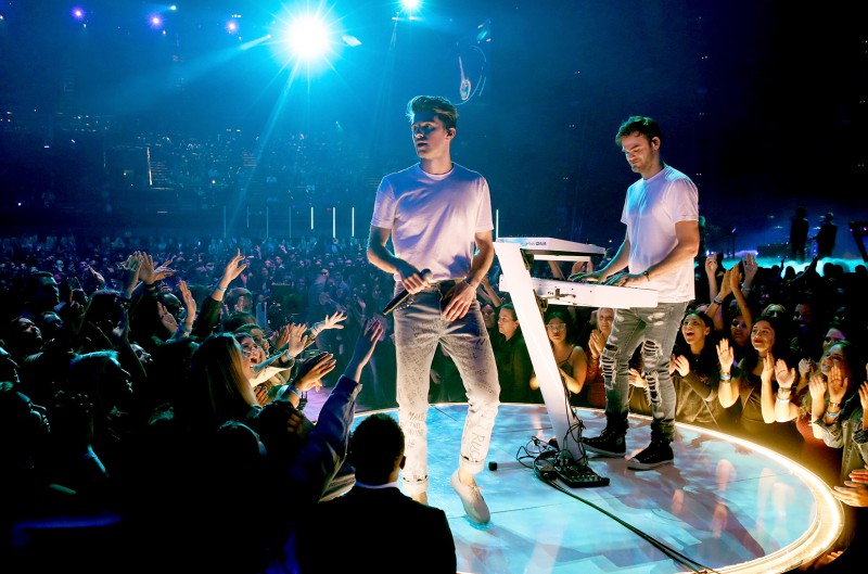 INGLEWOOD, CA - MARCH 05: Recording artists Andrew Taggart (L) and Alex Pall of The Chainsmokers perform onstage at the 2017 iHeartRadio Music Awards which broadcast live on Turner's TBS, TNT, and truTV at The Forum on March 5, 2017 in Inglewood, California. (Photo by Christopher Polk/Getty Images for iHeartMedia)